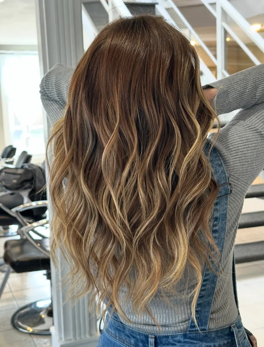 Long brunette balayage with soft waves