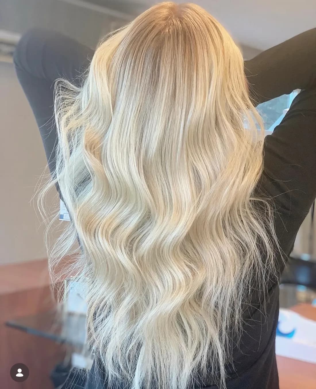 Long, full hair extensions with voluminous waves