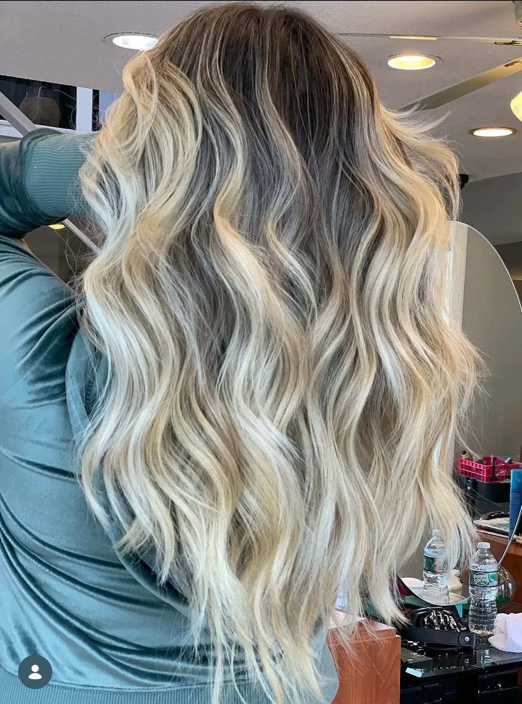 Long, thick beachy waves created with hair extensions